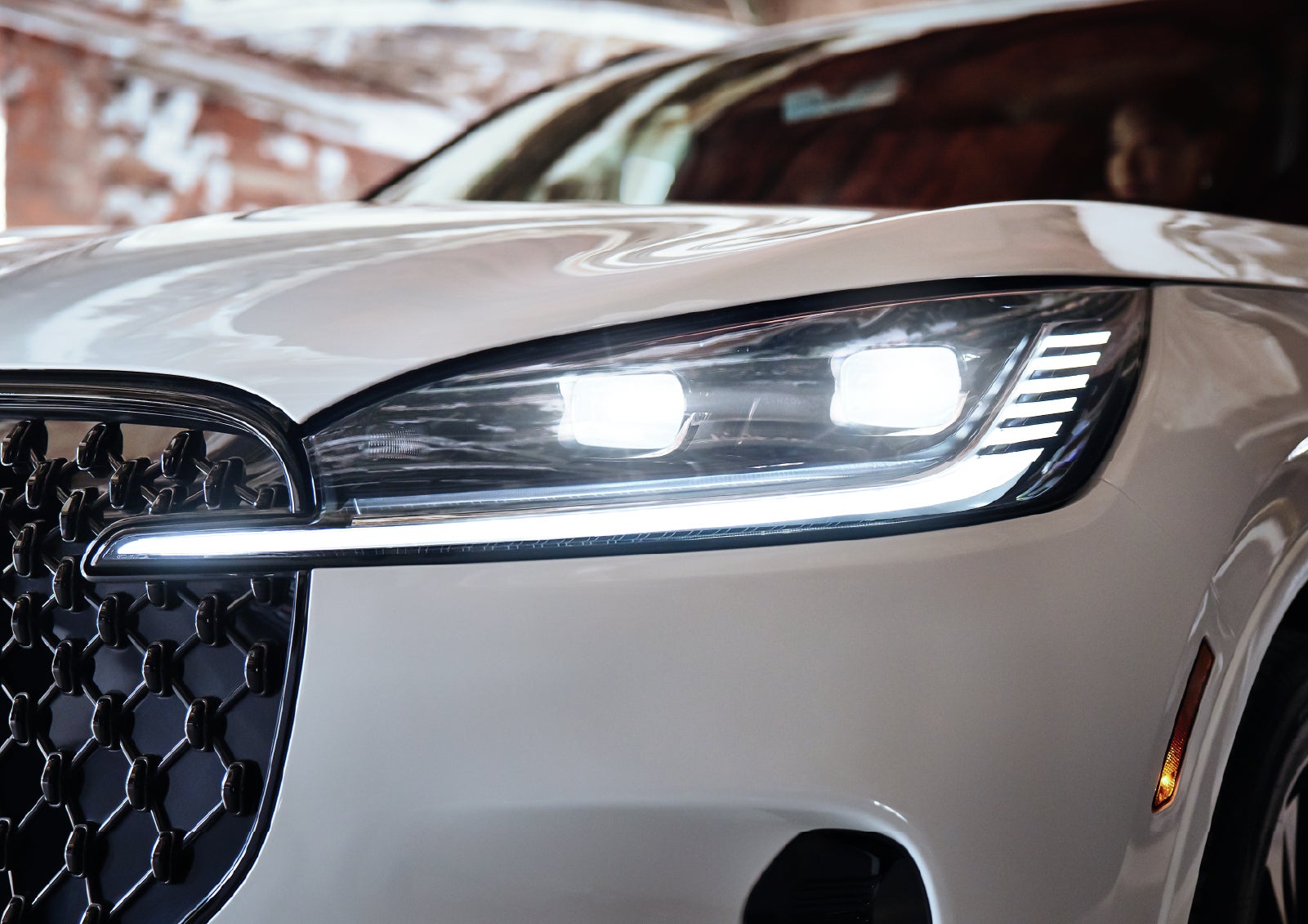 A close-up of a headlamp on the 2027 Lincoln Aviator® SUV is shown. | Dutch Miller Lincoln of Ashland in Ashland KY