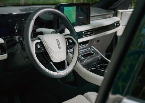 The leather-trimmed steering wheel of a 2027 Lincoln Aviator® Black Label™ SUV. | Dutch Miller Lincoln of Ashland in Ashland KY